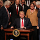 President Donald Trump smiles after signing policy changes he is making toward Cuba at the Manuel Artime Theater in the Little Havana neighborhood on June 16, 2017 in Miami, Florida.